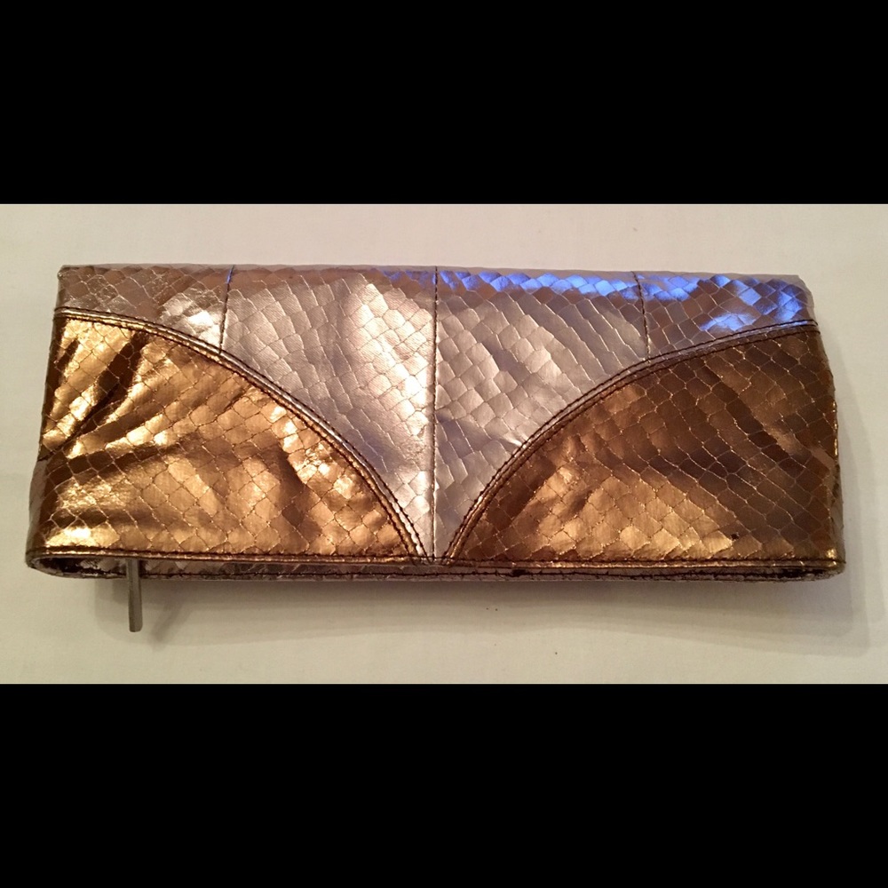 Metallic fold over clutch